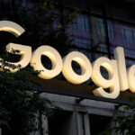 NEW YORK, NY - AUGUST 18: A Google corporate logo hangs above the entrance of their St. John's Terminal office building on August 18, 2026, in New York City. (Photo by Gary Hershorn/Getty Images)